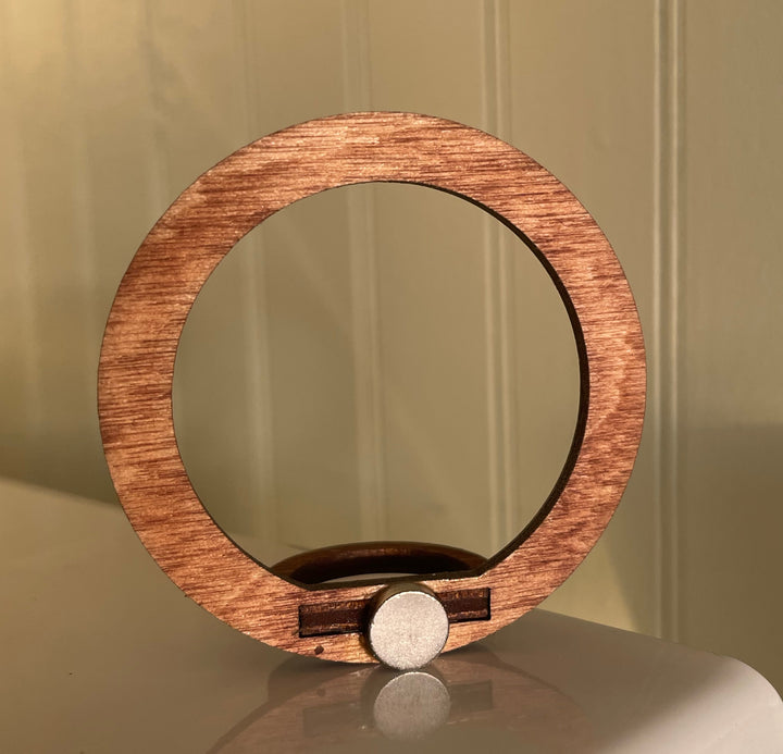 Make a statement with this sleek magnetic air plant holder. Walnut finish.   Magnet measures 2" x 2"    *DOES NOT INCLUDE AIR PLANT. Works best with small and medium air plant sizes.* Explore the best and coolest gift ideas for plant enthusiasts!