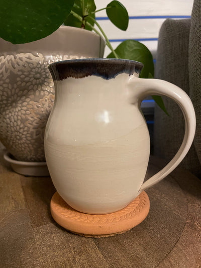 These small batch, handmade mugs are available in blue or green. Each mug is stamped with a unique plant design. Explore the best and coolest gift ideas for plant enthusiasts!