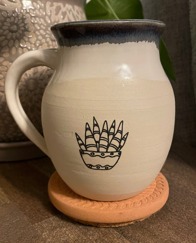 B5 These small batch, handmade mugs are available in blue or green. Each mug is stamped with a unique plant design. Explore the best and coolest gift ideas for plant enthusiasts!