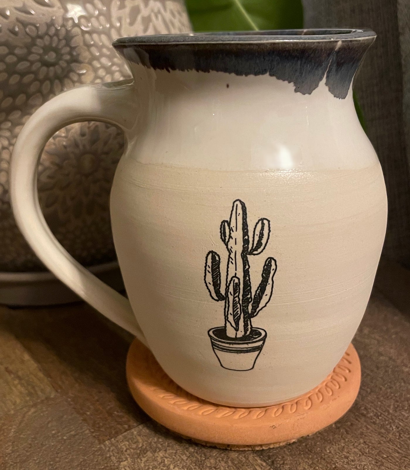 B7 These small batch, handmade mugs are available in blue or green. Each mug is stamped with a unique plant design. Explore the best and coolest gift ideas for plant enthusiasts!