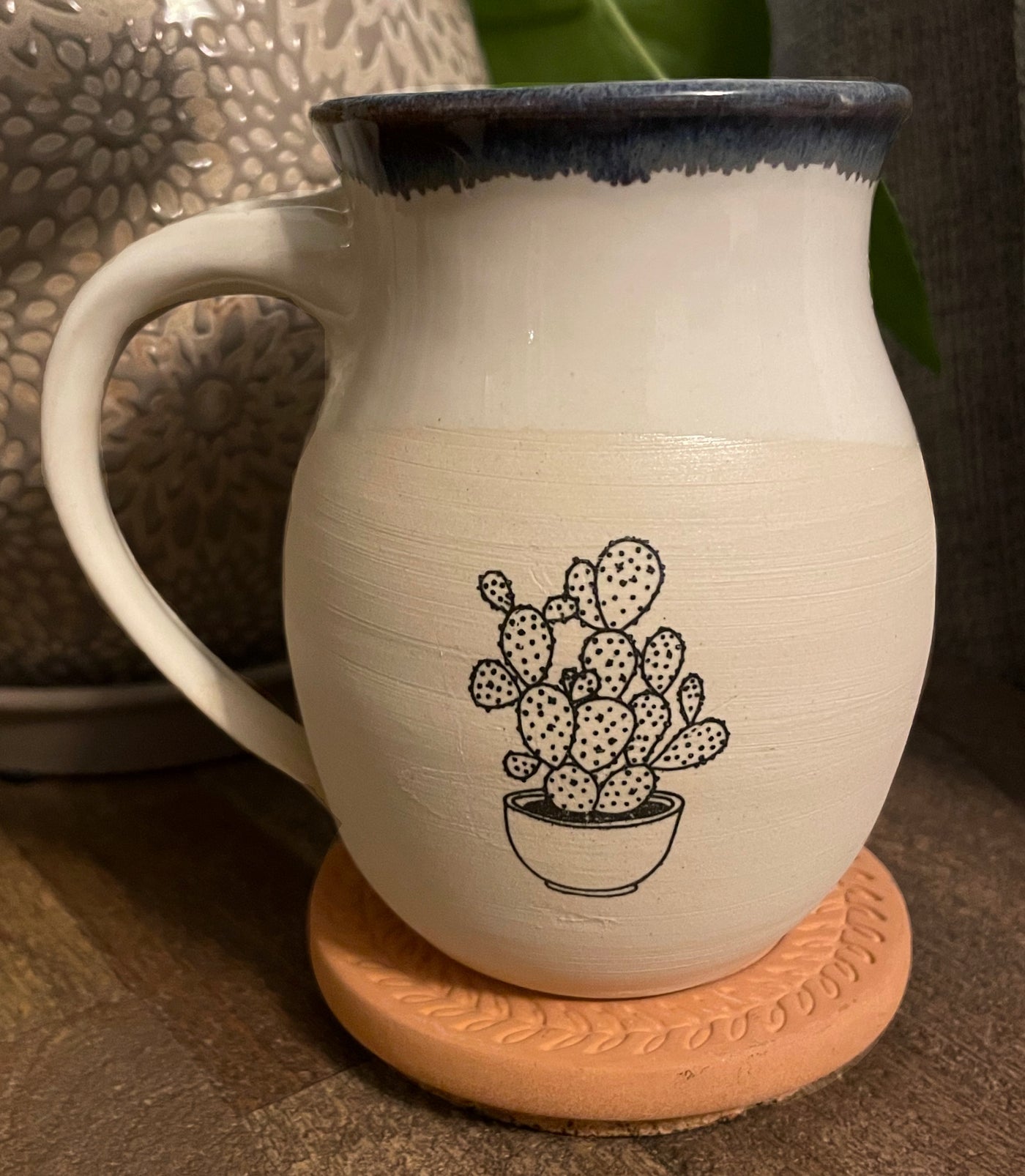 B8 These small batch, handmade mugs are available in blue or green. Each mug is stamped with a unique plant design. Explore the best and coolest gift ideas for plant enthusiasts!