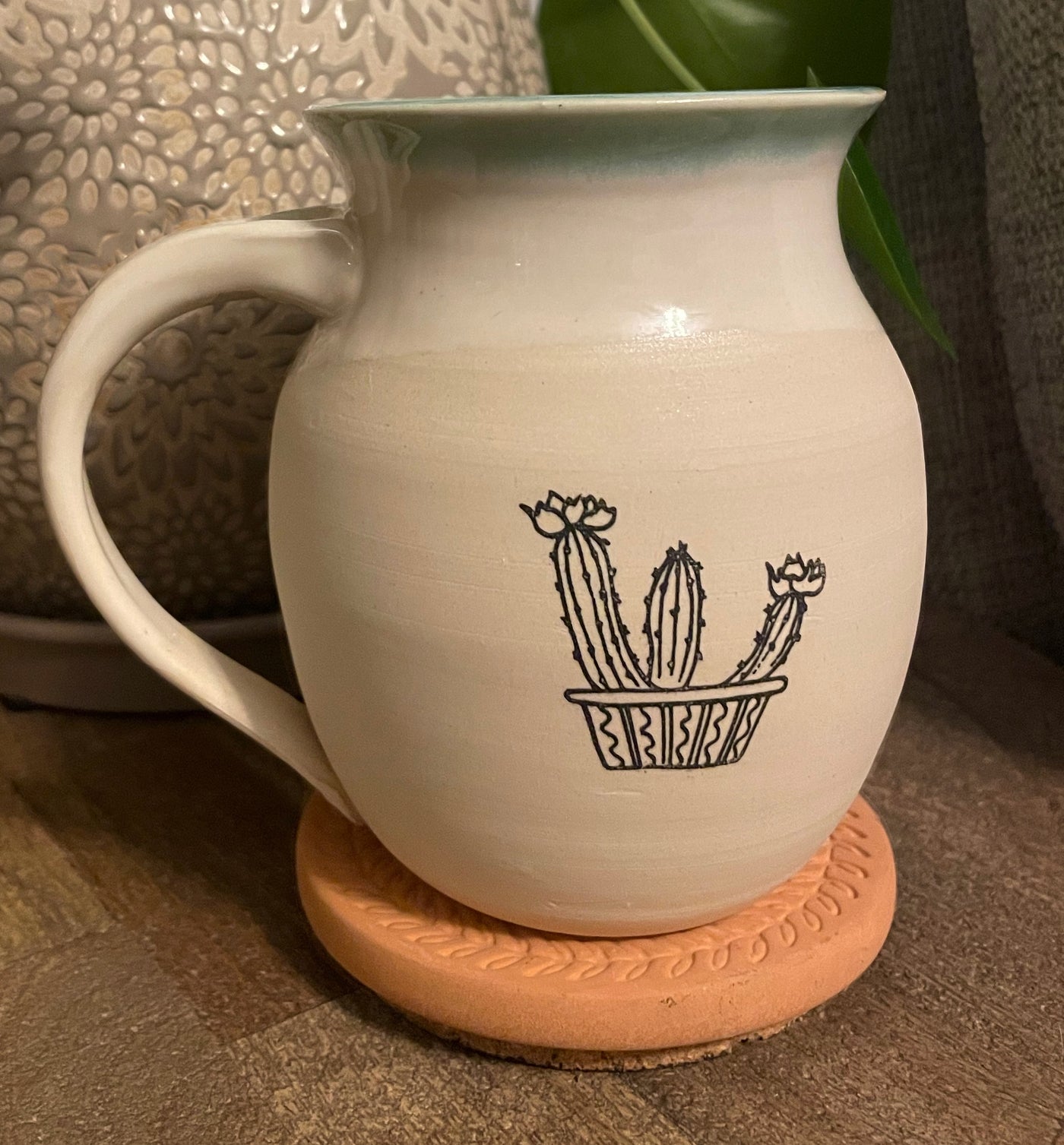 G2 These small batch, handmade mugs are available in blue or green. Each mug is stamped with a unique plant design. Explore the best and coolest gift ideas for plant enthusiasts!
